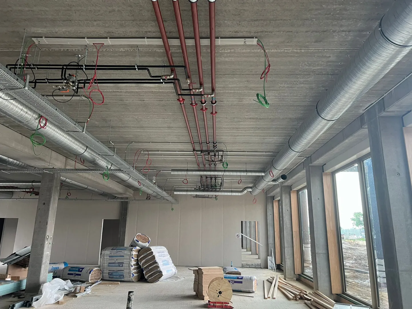 Commercial building HVAC and pipework installation in progress